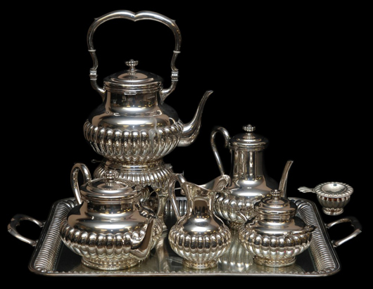 Seven-piece Genoese (Italian) 916 silver tea set with serving tray. Estimate: $8,000-$12,000. Image courtesy of Elite Decorative Arts.